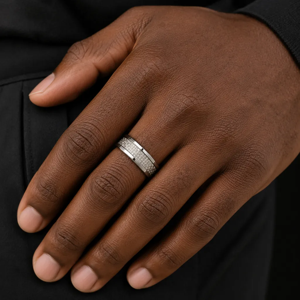 tungsten-ring-with-white-carbon-fiber-inlay-on-hand.webp