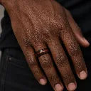 8mm-rose-wood-inlay-black-tungsten-ring-on-hand.webp