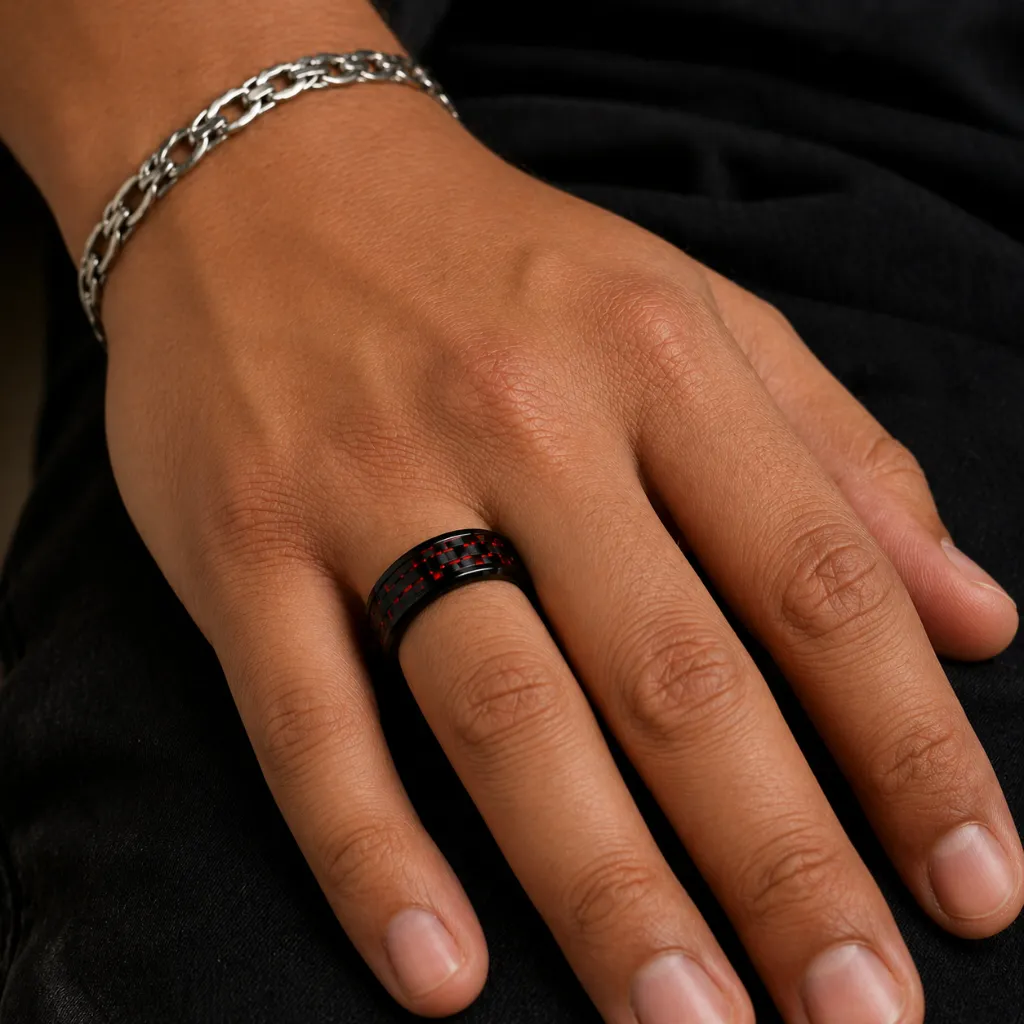 black-ceramic-ring-red-carbon-fiber-inlay-on-hand.webp
