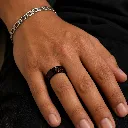 black-ceramic-ring-red-carbon-fiber-inlay-on-hand.webp