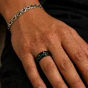 black-ceramic-ring-green-carbon-fiber-on-hand.webp