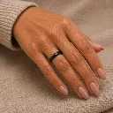 womens-4mm-domed-black-tungsten-ring-on-hand.webp